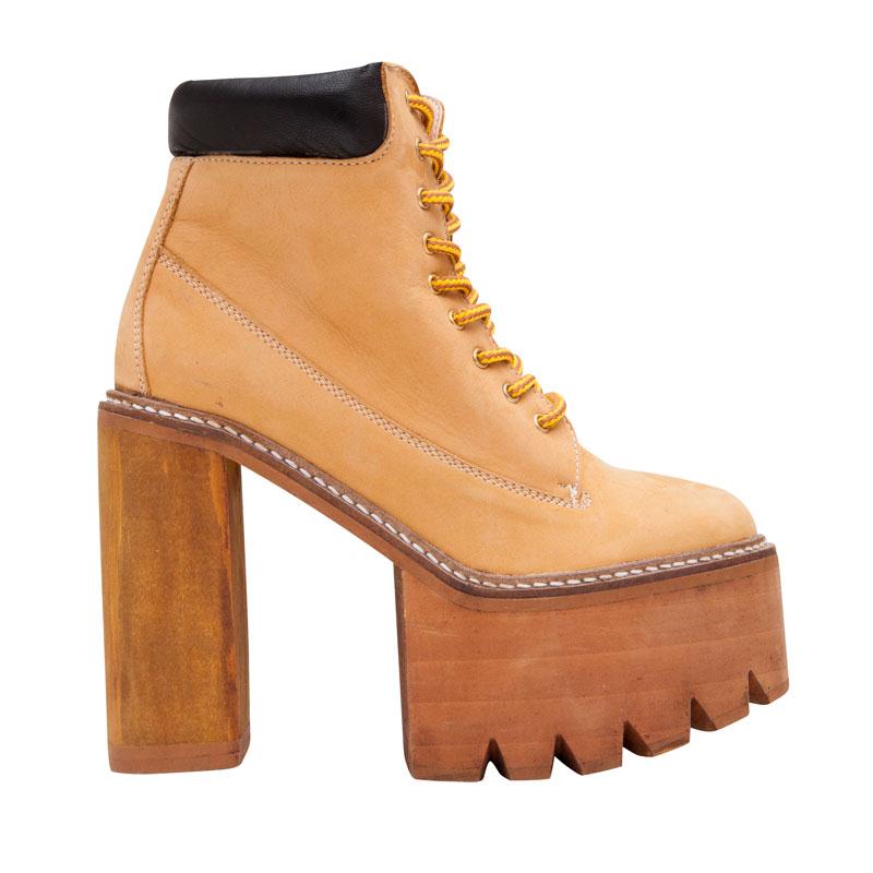 Borcegos negros con detalles en la punta | Zapatos tenis para mujer,  Zapatos altos de moda, Zapatos mujer de moda
