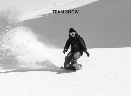Rider de snow con tabla Vans