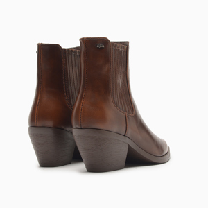 a pie-Botas-Jersey SN