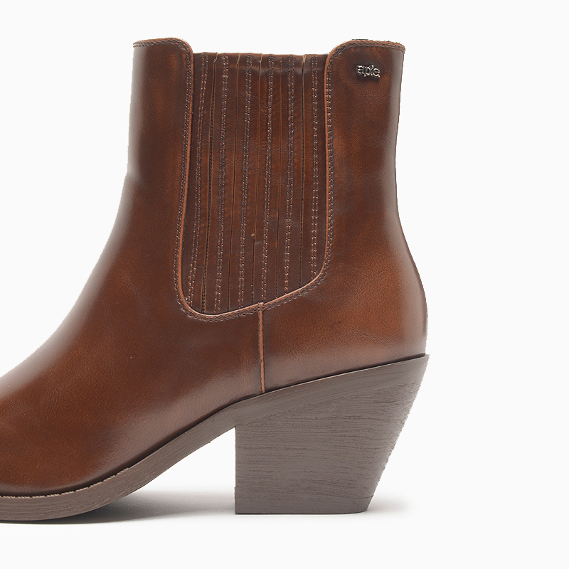 a pie-Botas-Jersey FN